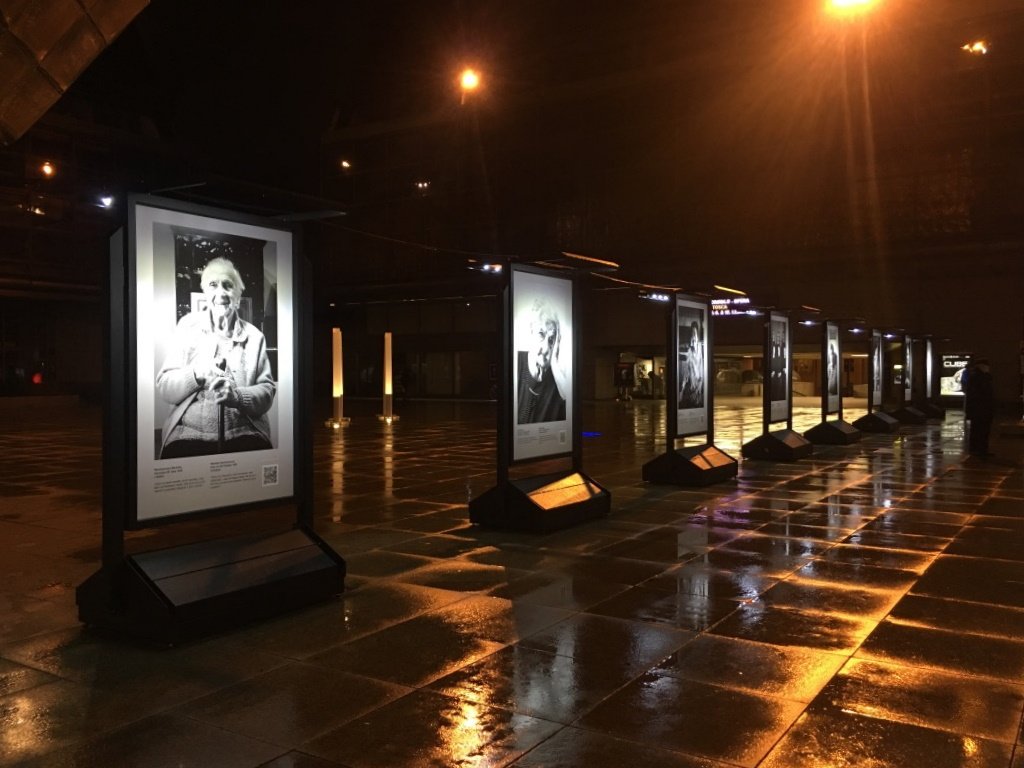 Open air exhibition of seniors who lived through tough times. Each image had a story to tell artwork