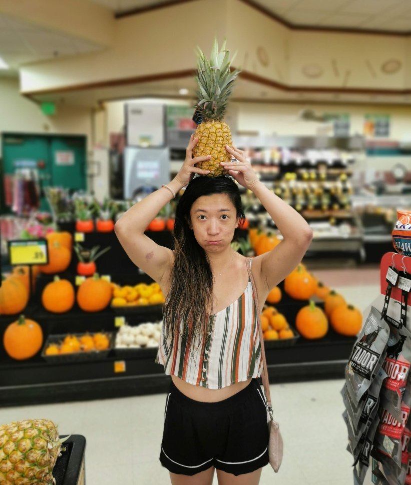 Purchasing snacks for our camping pineapple