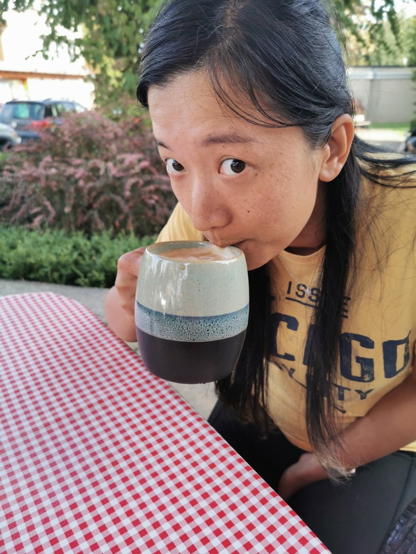 JJ drinks coffee
